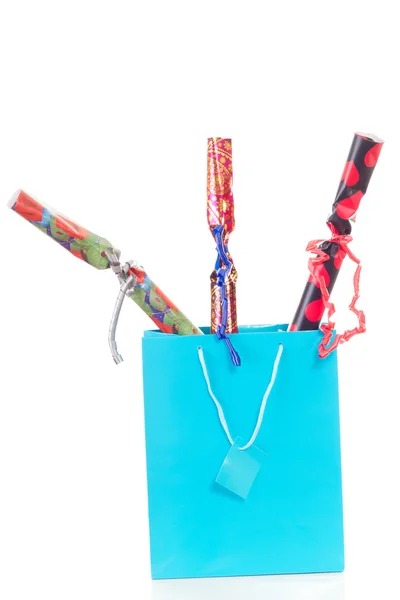 Blue shopping bag with three gifts for christmas — Stock Photo, Image