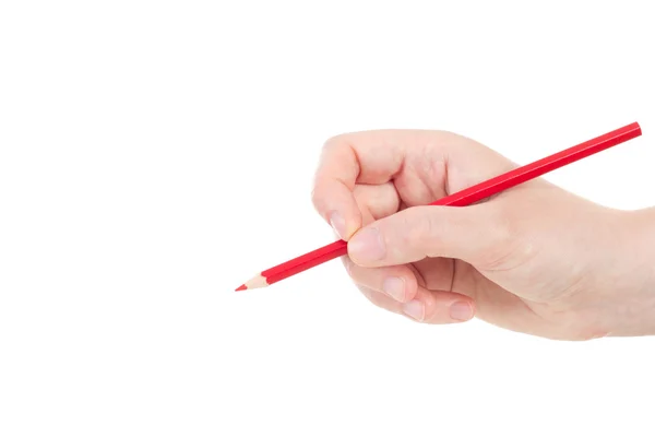 Caucasian hand with red pencil — Stock Photo, Image