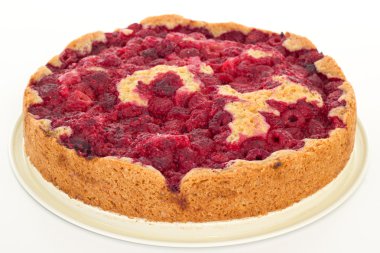 Freshly baked cake with raspberries clipart