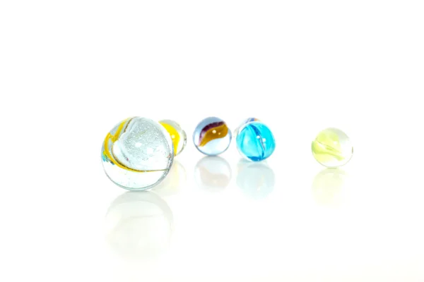 Colourful marbles on white background — Stock Photo, Image