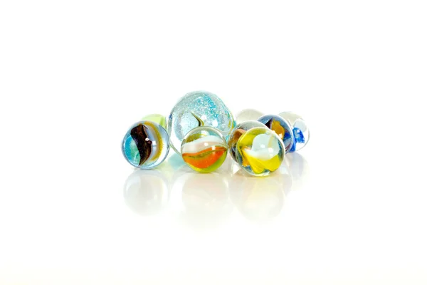 Colourful marbles on white background — Stock Photo, Image