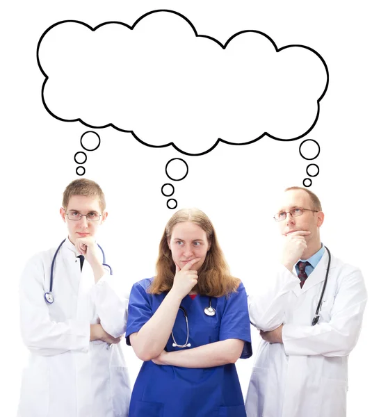 Equipe médica pensando em algo — Fotografia de Stock