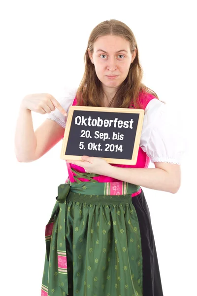 Mädchen im Dirndl zeigt Oktoberfestzeit 2014 auf Kreidetafel — Stockfoto