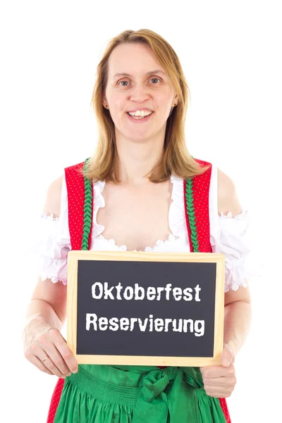 Blondine zeigt Tafel: Oktoberfest-Reservierung — Stockfoto