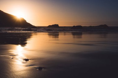 Harris Beach Oregon gün batımında