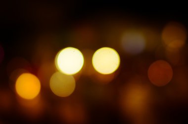 Photo of bokeh lights on black background clipart