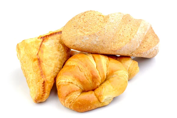 Samenstelling met brood en broodjes geïsoleerd op wit — Stockfoto