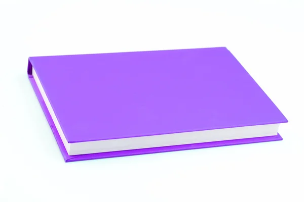 Libro púrpura sobre aislado — Foto de Stock
