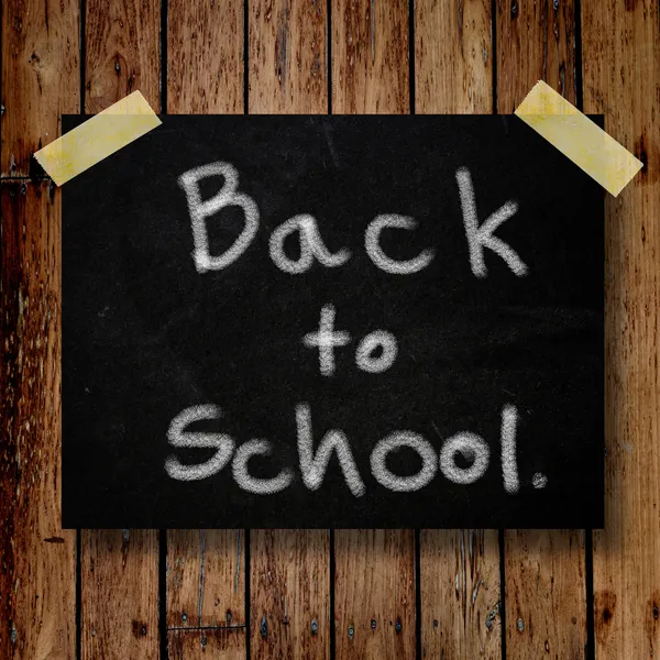 Back to school on message note with wooden background — Stock Photo, Image