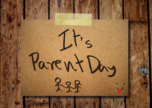 Happy parent day on note paper with wooden background — Stock Photo, Image