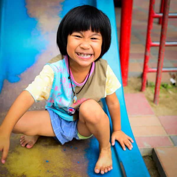 Happy Asian girl on playground — Stock Photo, Image