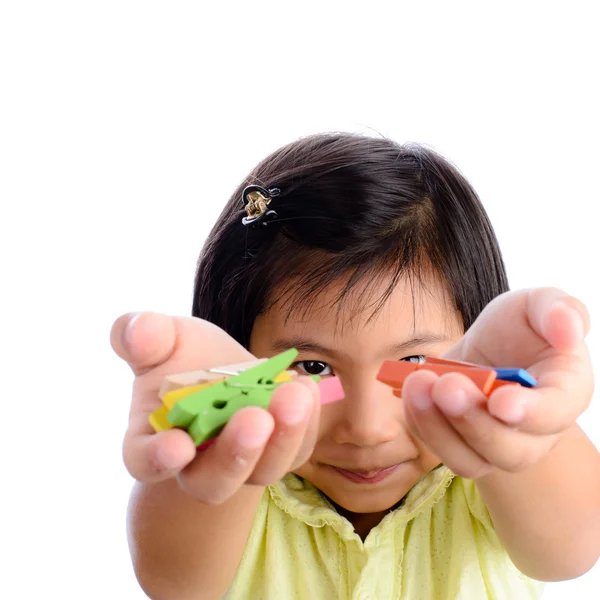 Asian girl present cloth clips box on her hand — Stock Photo, Image