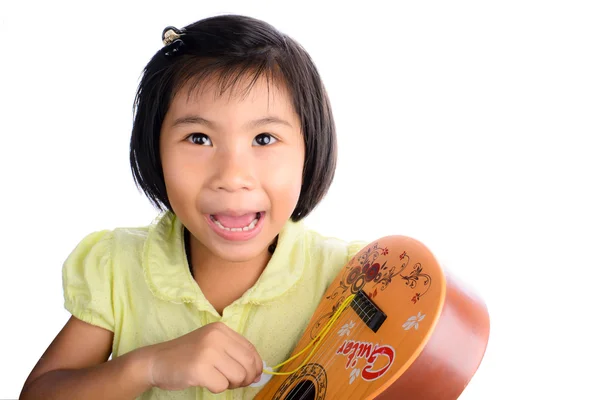 Funny ASian girl playing guitar isolated on white — Stock Photo, Image