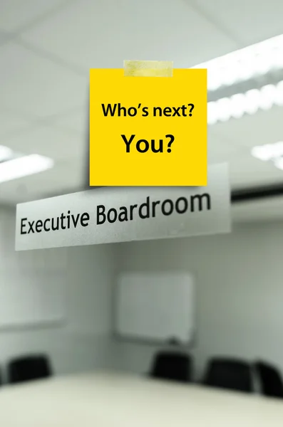 Yellow note message "who's next' on Meeting room,take photo from — Stock Photo, Image