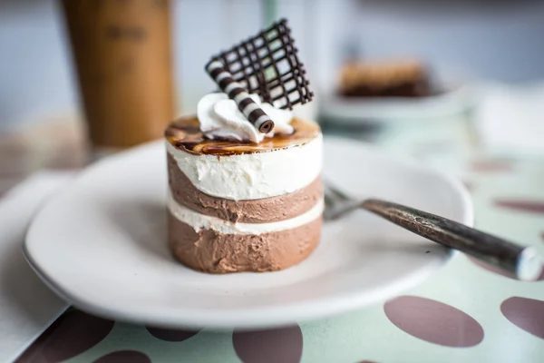 Chocolate moose dessert on a white plate — Stock Photo, Image