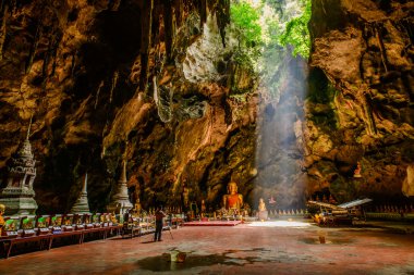 Sunbeam in buddha cave, Tham Khao Luang near Phetchaburi,Thailan clipart