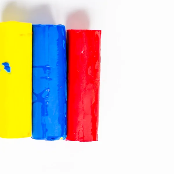 Um conjunto de três cores de argila modelagem — Fotografia de Stock