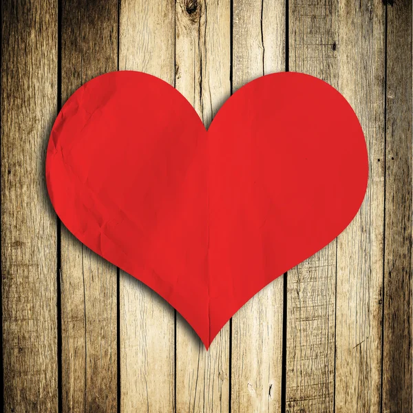 Symbol lásky na staré dřevěné stěny — Stock fotografie