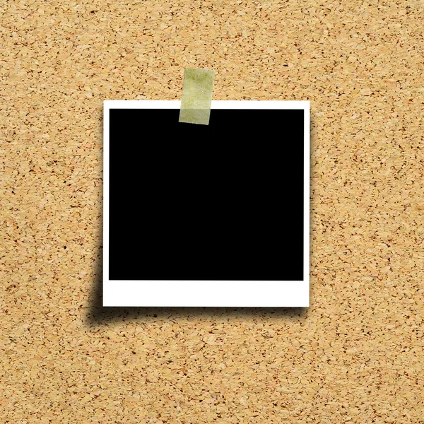 Photo on cork board background — Stock Photo, Image