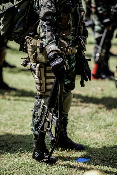 Part of soldier with gun — Stock Photo, Image