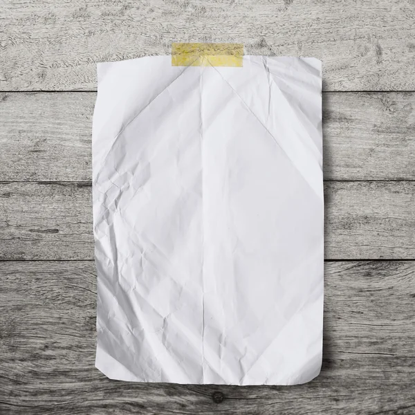 Blank crumpled paper on wooden background — Stock Photo, Image