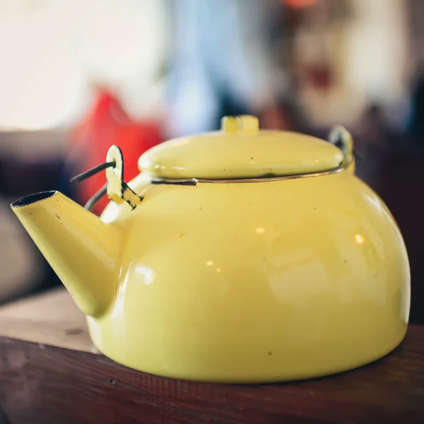 Yellow vintage metallic kettle Stock Photo by ©Jayjaynaenae 37815331