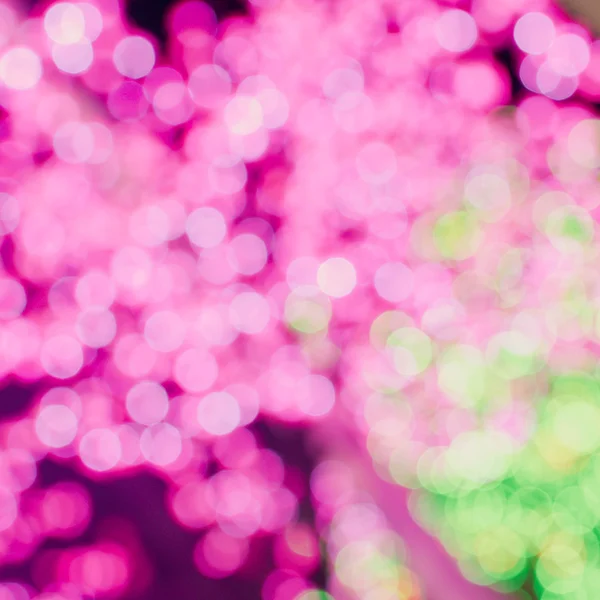 รูปภาพของไฟ bokeh บนพื้นหลังสีดํา — ภาพถ่ายสต็อก