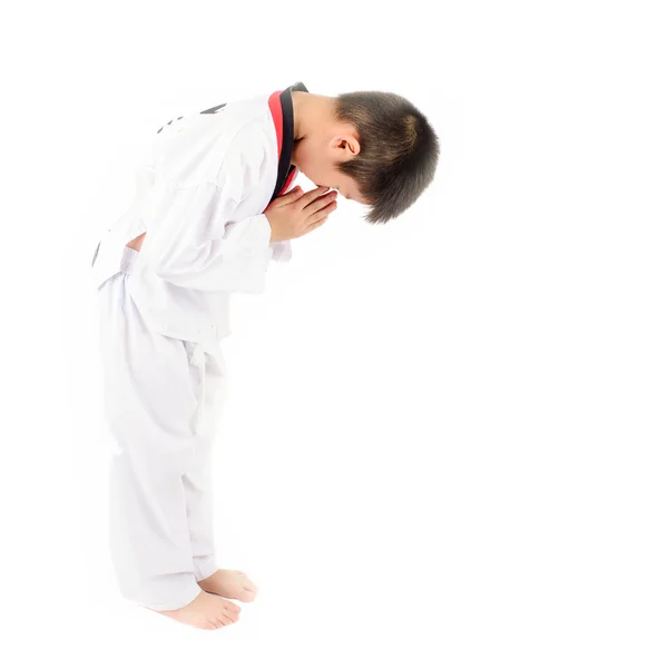 Jovem menino formação taekwondo ação isolada — Fotografia de Stock