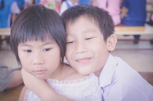 Brother hug his sister with love — Stock Photo, Image