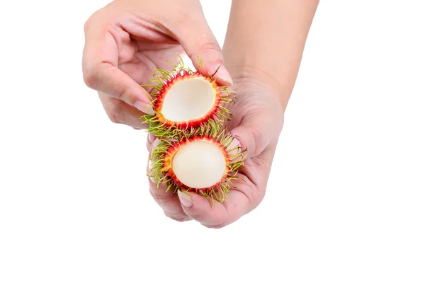 Rambutans na ręce — Zdjęcie stockowe