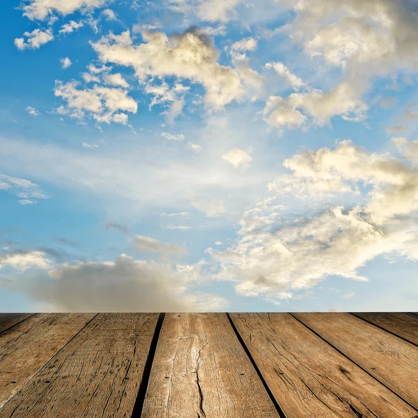 Wood floor with cloud and blue sky — Stock Photo, Image