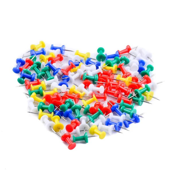 Färgglada push pins i hjärta form på vit bakgrund — Stockfoto