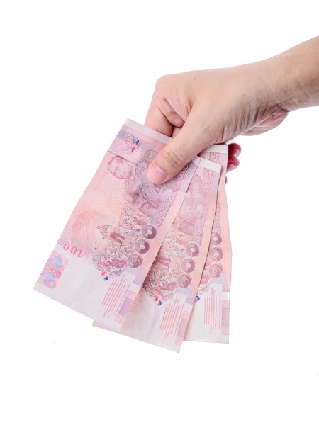 Tenendo in mano i soldi tailandesi isolati su bianco . — Foto Stock