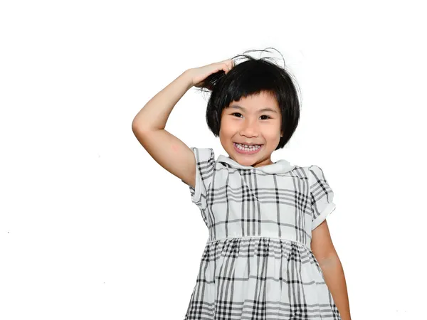 Happy Asian girl scratching her head and smiling — Stock Photo, Image