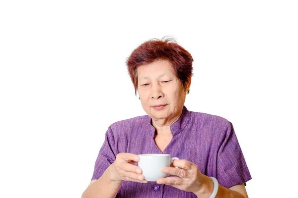 Vieja con una taza de café o té — Foto de Stock