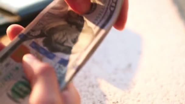 Hand Puts Hundred Dollar Bill Pile Takes Banknote Cash Money — Stock Video