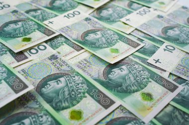 Background from money. Polish banknotes. 100 zloty