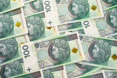 Background from money. Polish banknotes. 100 zloty