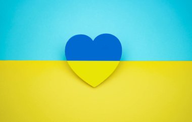 Flag of Ukraine and blue yellow heart. Symbol of love for country. Independence