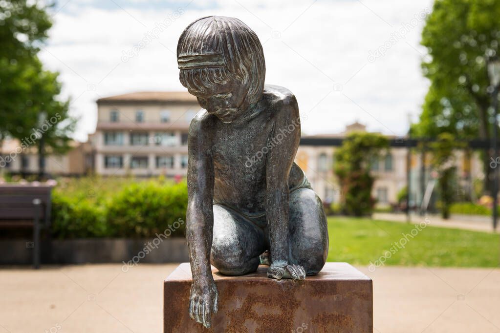 Gambetta Square Decorative Child Statue in Carcassone France on a Sunny Spring Day