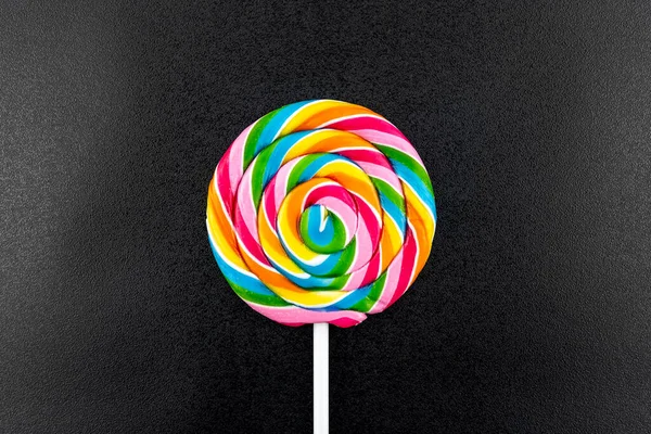 Sweet Spiral Shaped Colorful Lollipop Lying Center Isolated Black Rough — Stock Photo, Image