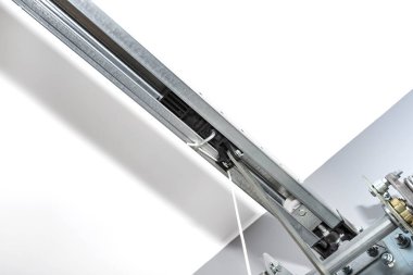 Disconnecting the electric drive in the guide of the home garage door.