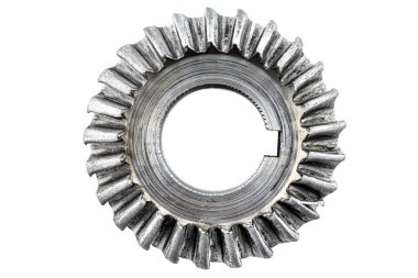 Macro shot of a damaged bevel gear with bevel teeth, isolated on a white background, top view.