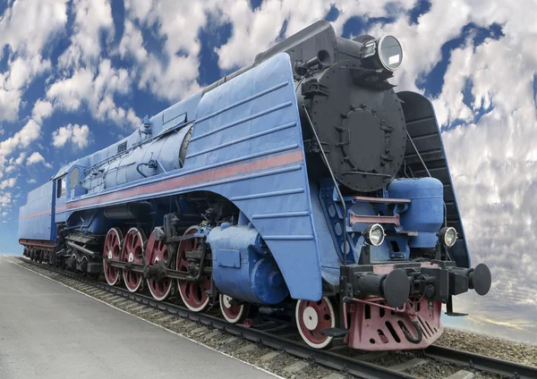 De blauwe uitdrukkelijke stoomlocomotief — Stockfoto