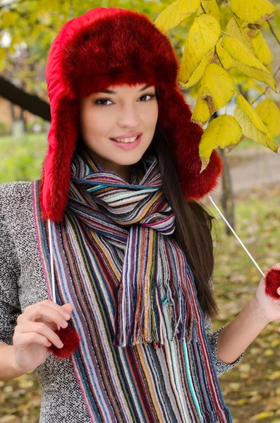 Sexy young brunette girl in autumn scene. — Stock Photo, Image