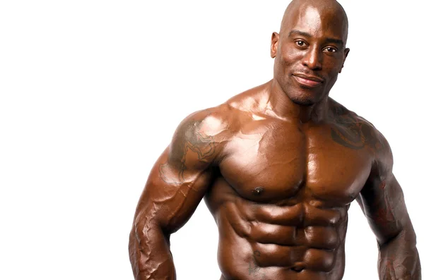 Ισχυρή bodybuilder άνδρας με τέλειους κοιλιακούς, τους ώμους, δικέφαλου, τρικέφαλος μύς και στο στήθος — Φωτογραφία Αρχείου