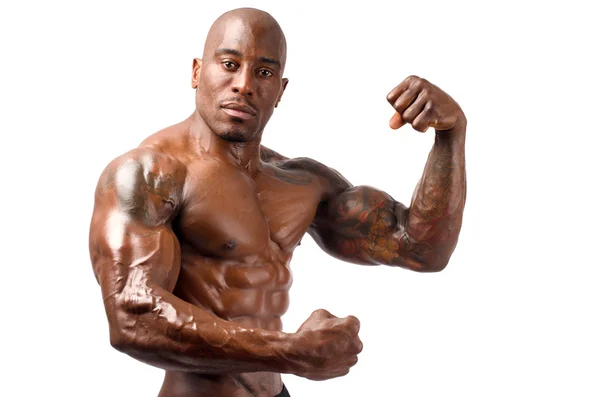 Forte bodybuilder uomo con addominali, spalle, bicipiti, tricipiti e petto perfetti — Foto Stock