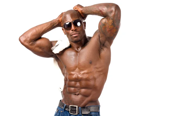 Forte bodybuilder uomo con addominali, spalle, bicipiti, tricipiti e petto perfetti — Foto Stock