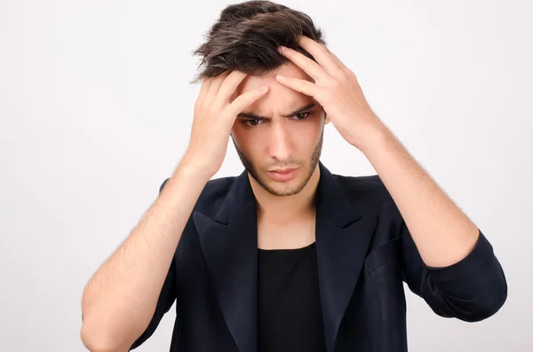 Young beautiful businessman stressed at work — Stock Photo, Image