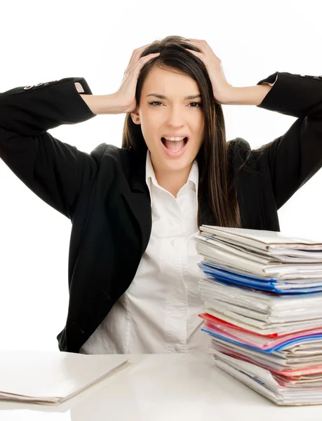 Business woman working under stressful conditions at work — Stock Photo, Image